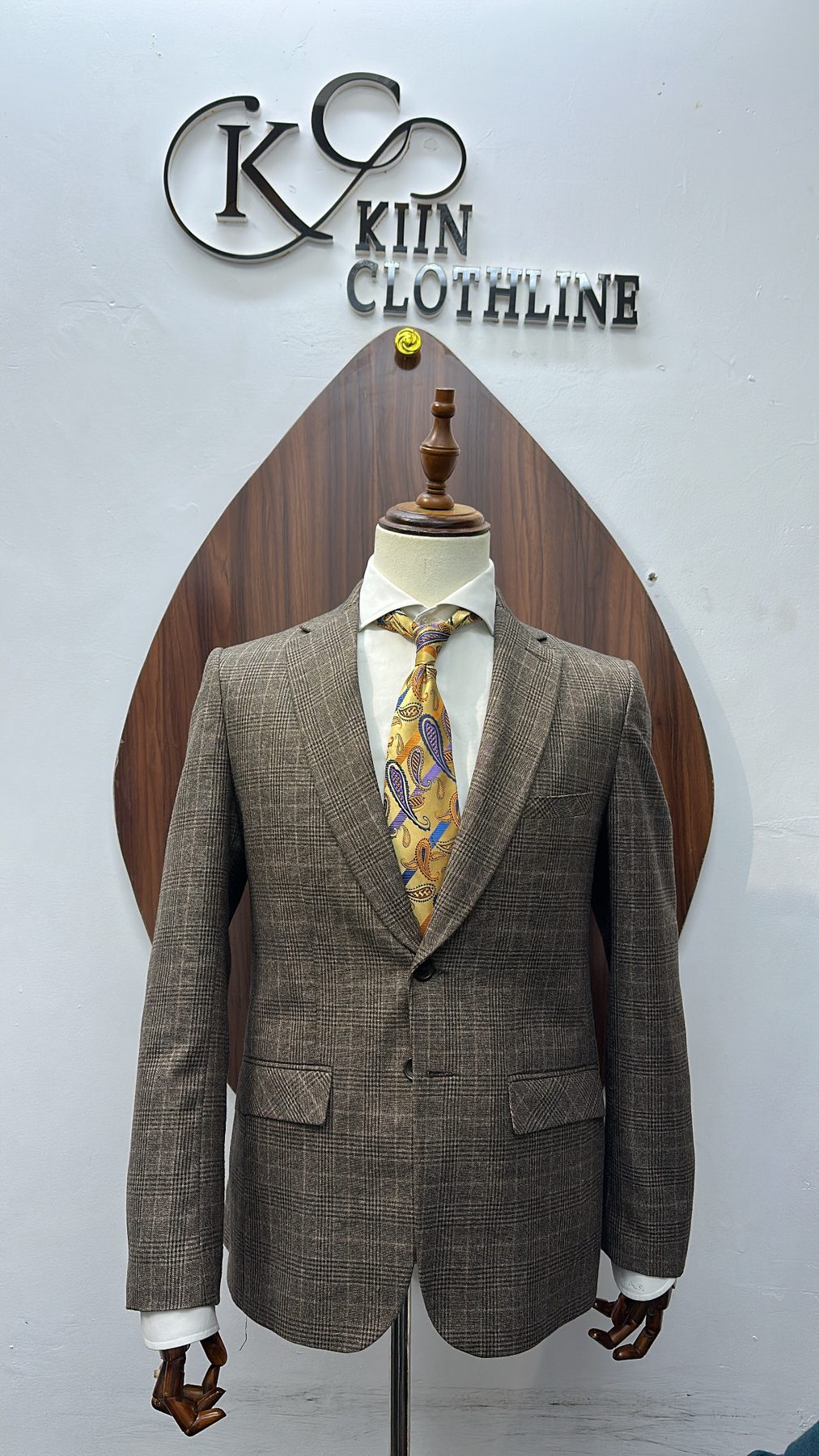 Brown check blazer on a Kiin Clothline mannequin